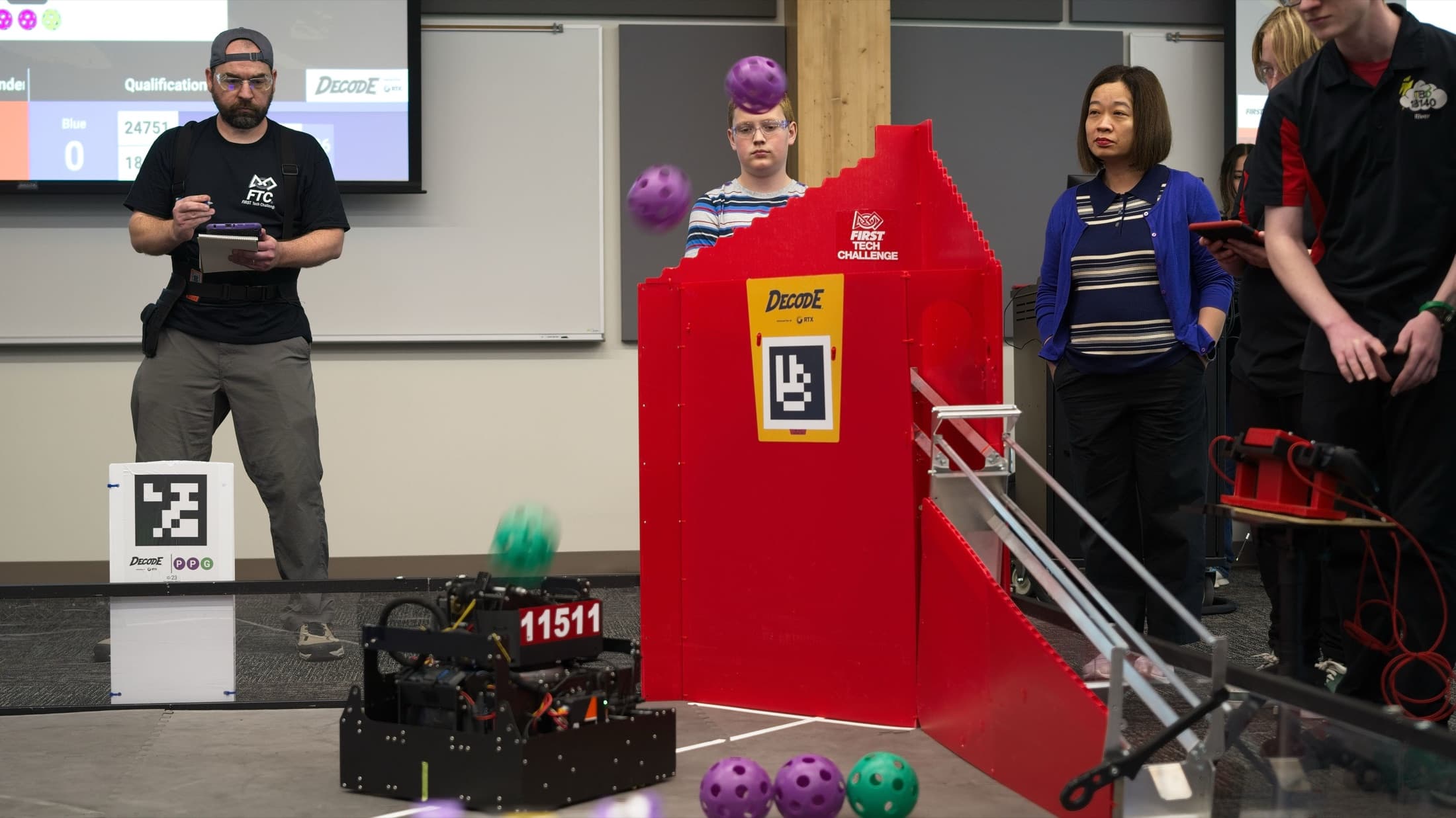 Referees robot in action scoring during a match