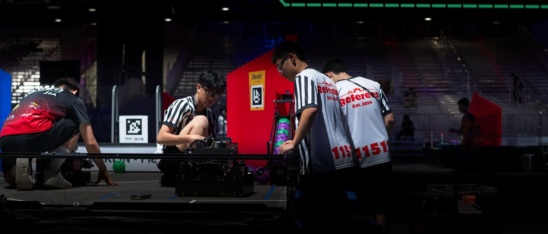 Referees on the field during world-level competition